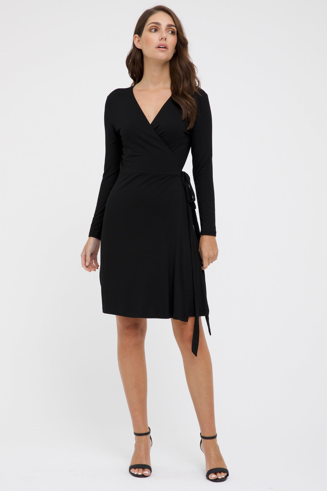 Black long sleeve wrap dress styled for cooler weather – sustainable wardrobe essential