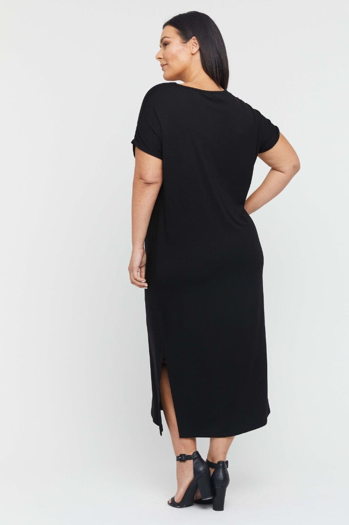 Back view of plus size black bamboo maxi dress with knee-length side splits and comfortable fit