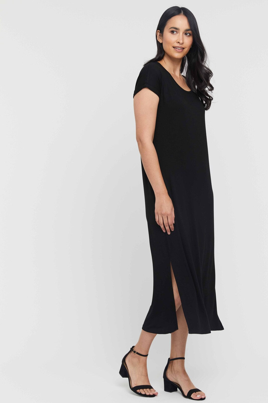 Black bamboo maxi dress styled on model with loose fit and breathable fabric