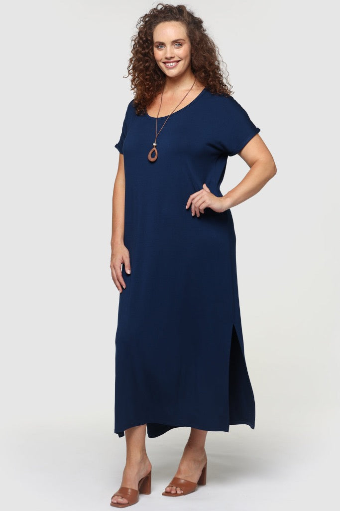 Navy plus size bamboo maxi dress on model with knee-high side splits and loose silhouette