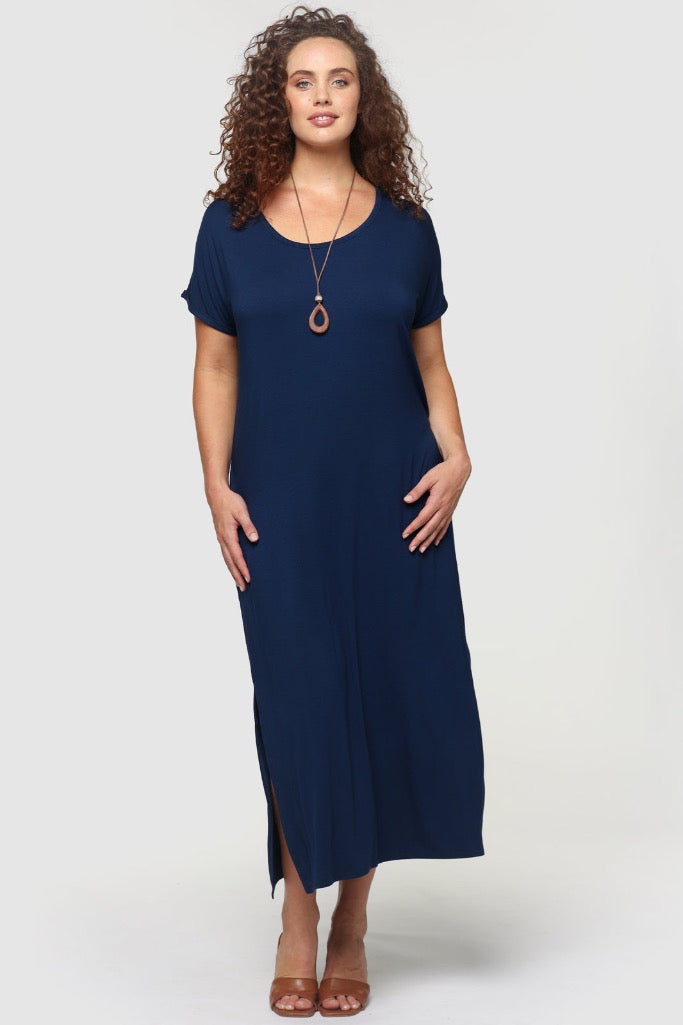 Relaxed-fit navy bamboo maxi dress on model with short folded sleeves and side slits