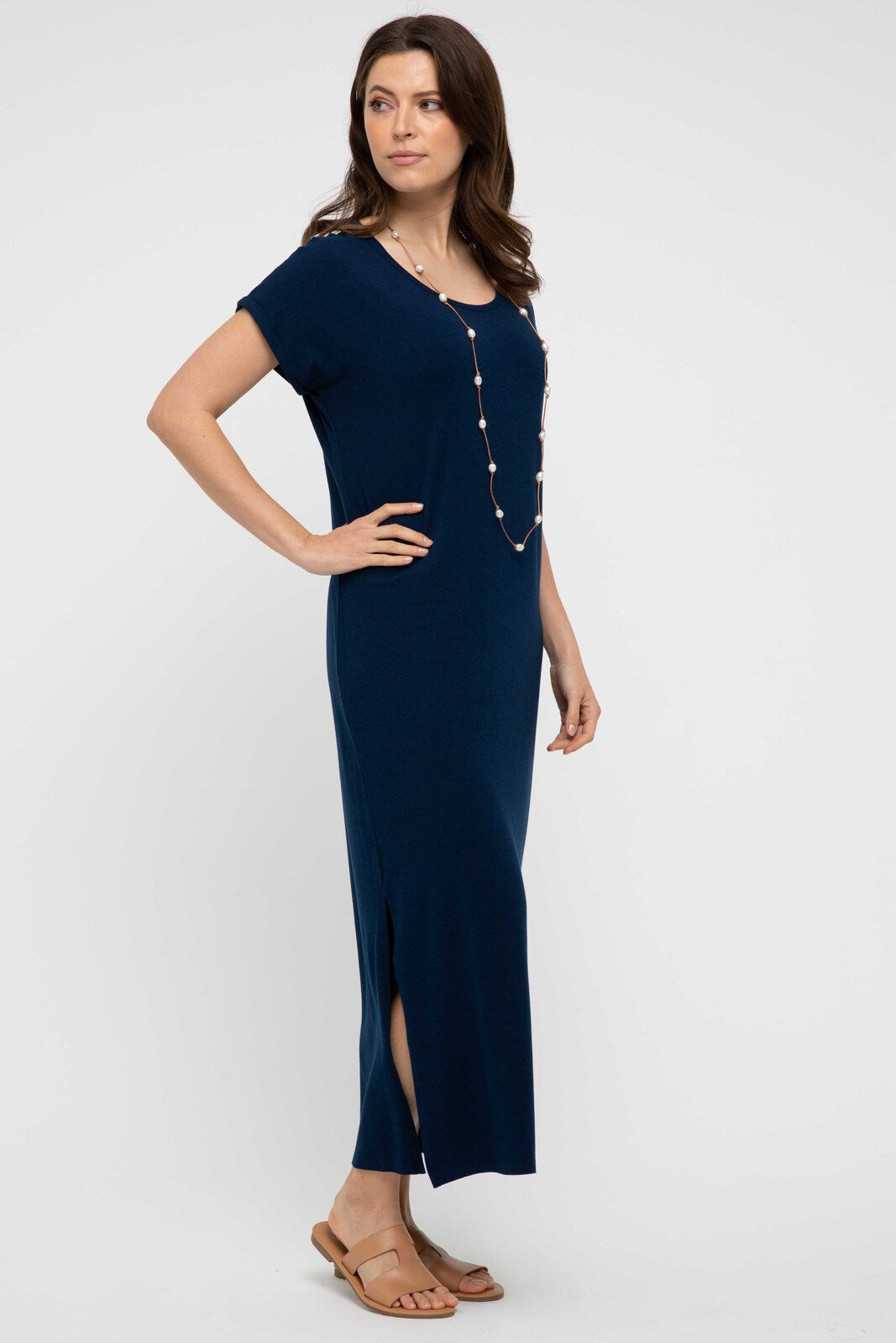 Navy bamboo maxi dress worn by model featuring scoop neck and relaxed oversized fit
