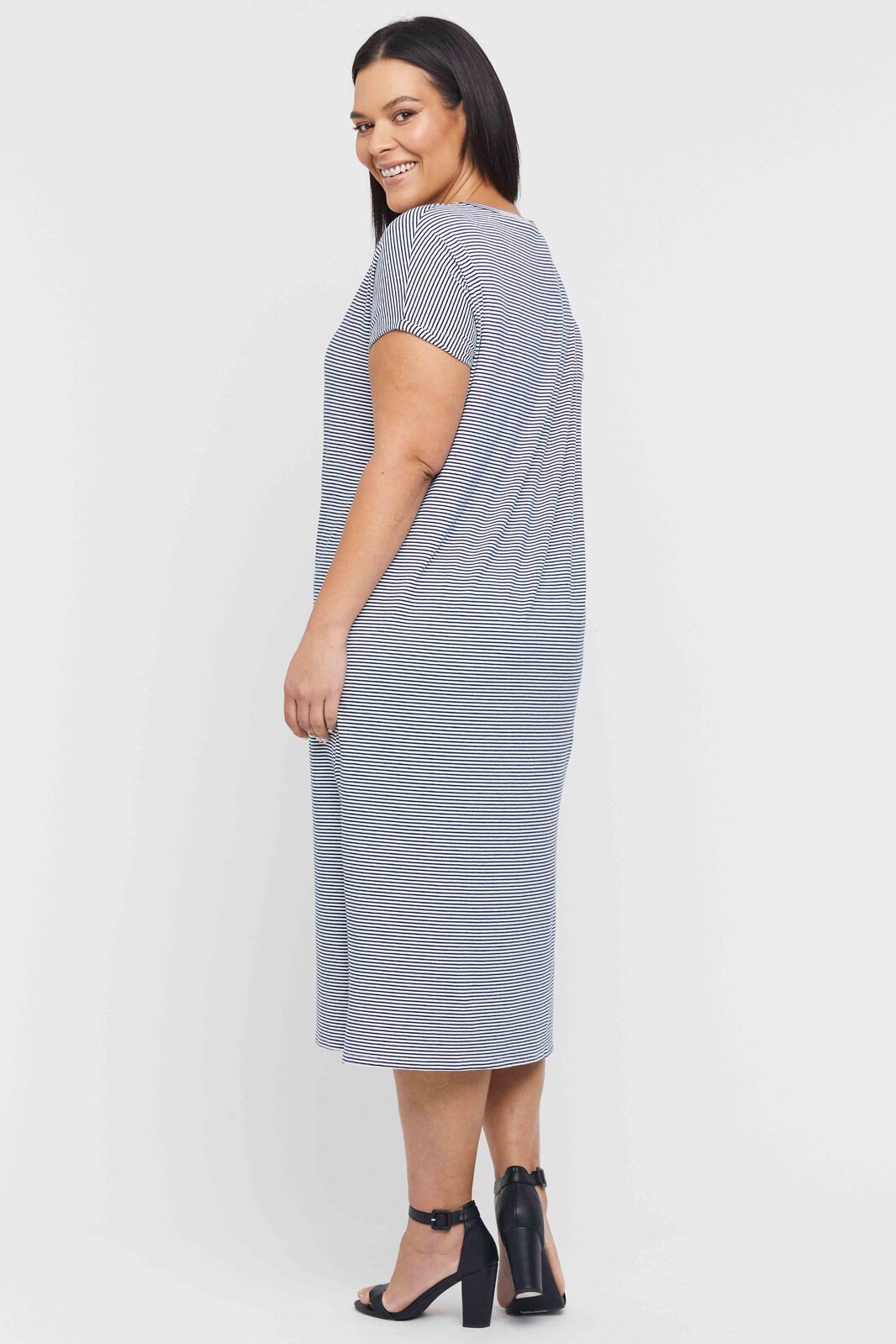 Back view of lightweight navy striped maxi dress with side splits – breathable bamboo fabric