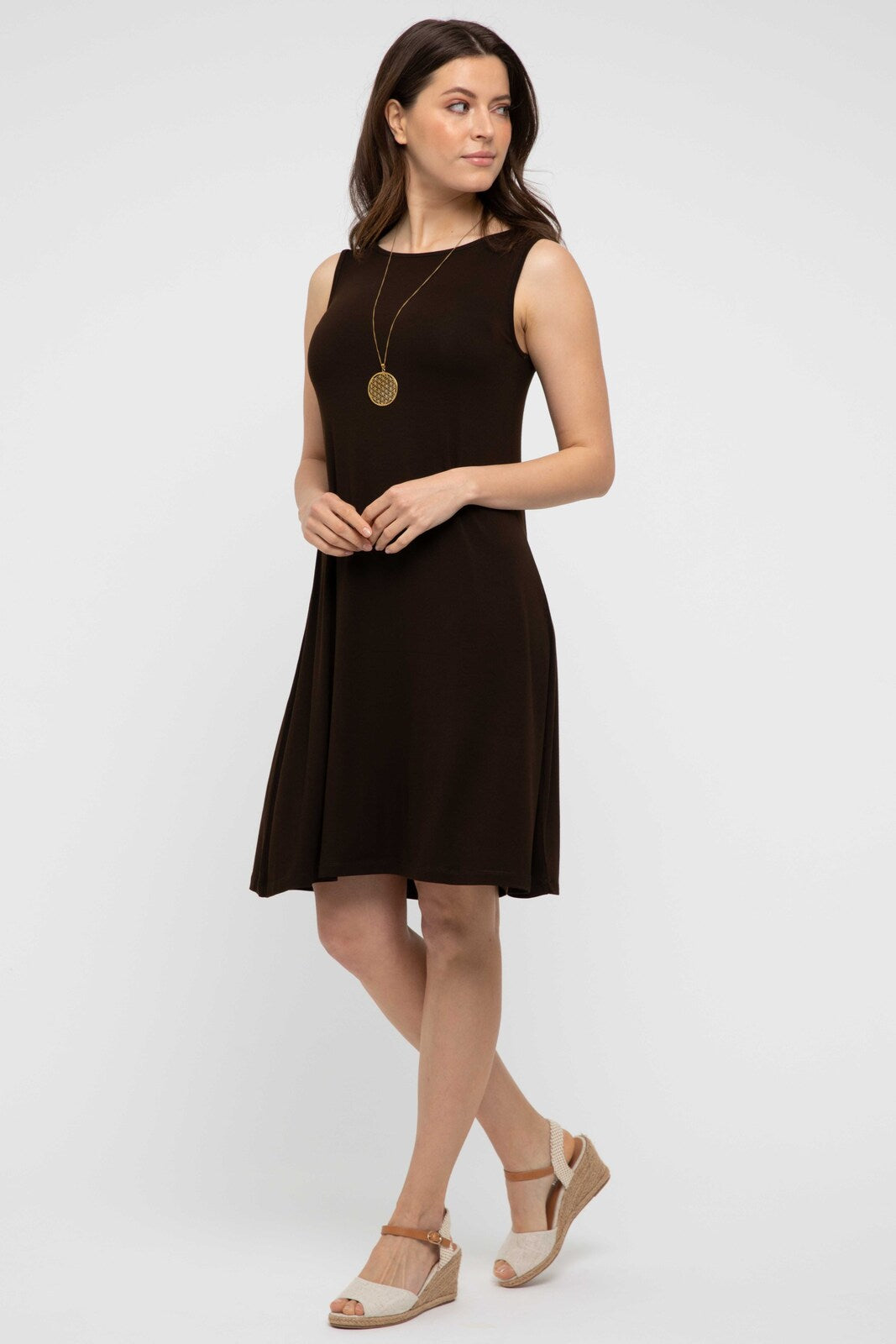 Sleeveless A-line dress with shell neckline and UPF 50+ protection.