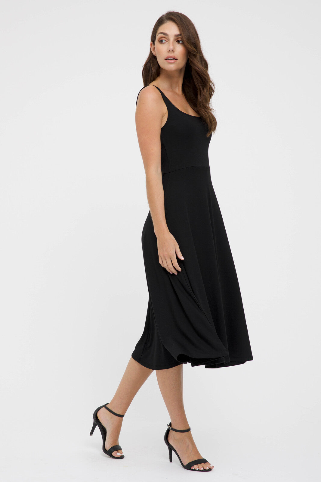 Sleeveless black midi dress made out of breathable and stretchy bamboo fabric.