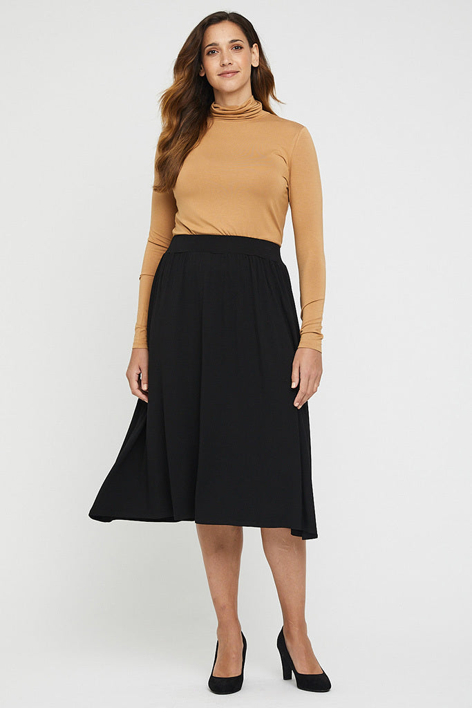 midi skirt in black for the office with heels and turtleneck top