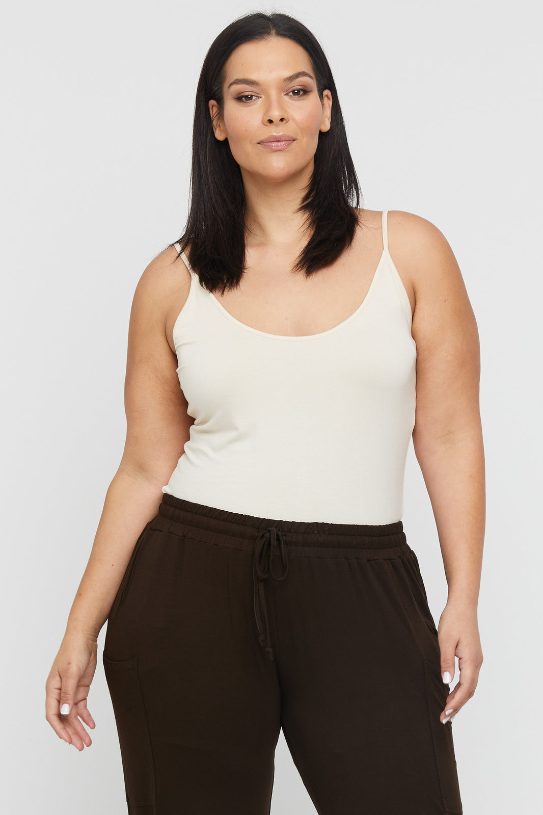 Ecru-coloured Lucia Bamboo Cami with thin straps and a scoop neckline making it a wardrobe essential.