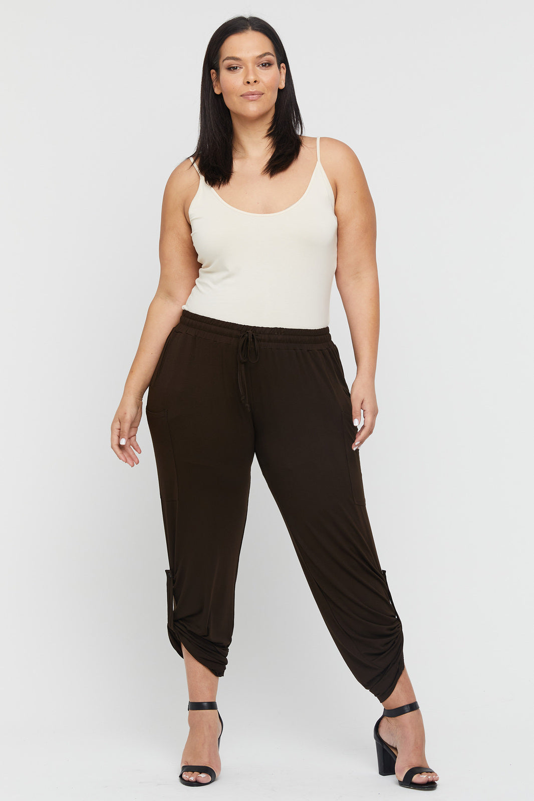 Fitted Ivory camisole with round neckline and slender thin straps.