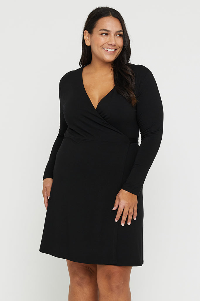 Close up of black bamboo dress with v neckline and long sleeves