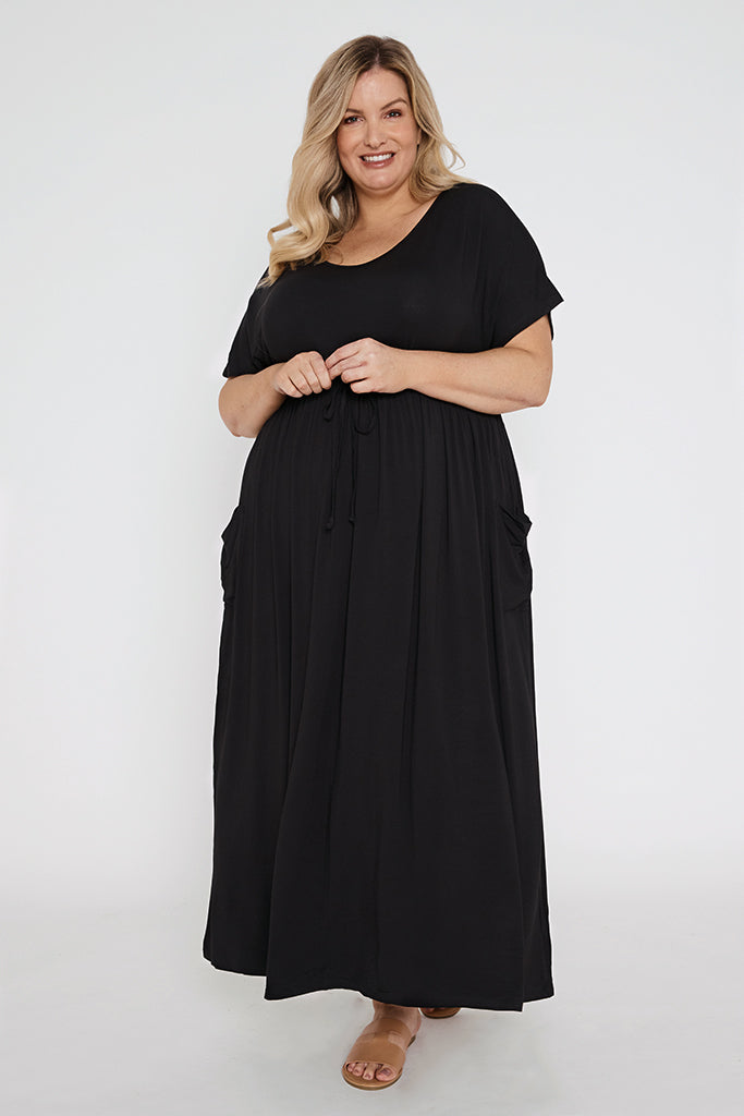 Black bamboo dress featuring short sleeves and side pockets.