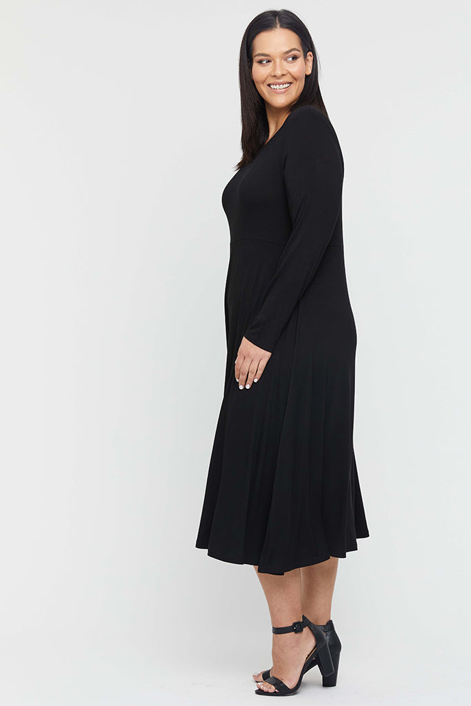 Cosy black bamboo dress perfect for professional winter outfits.