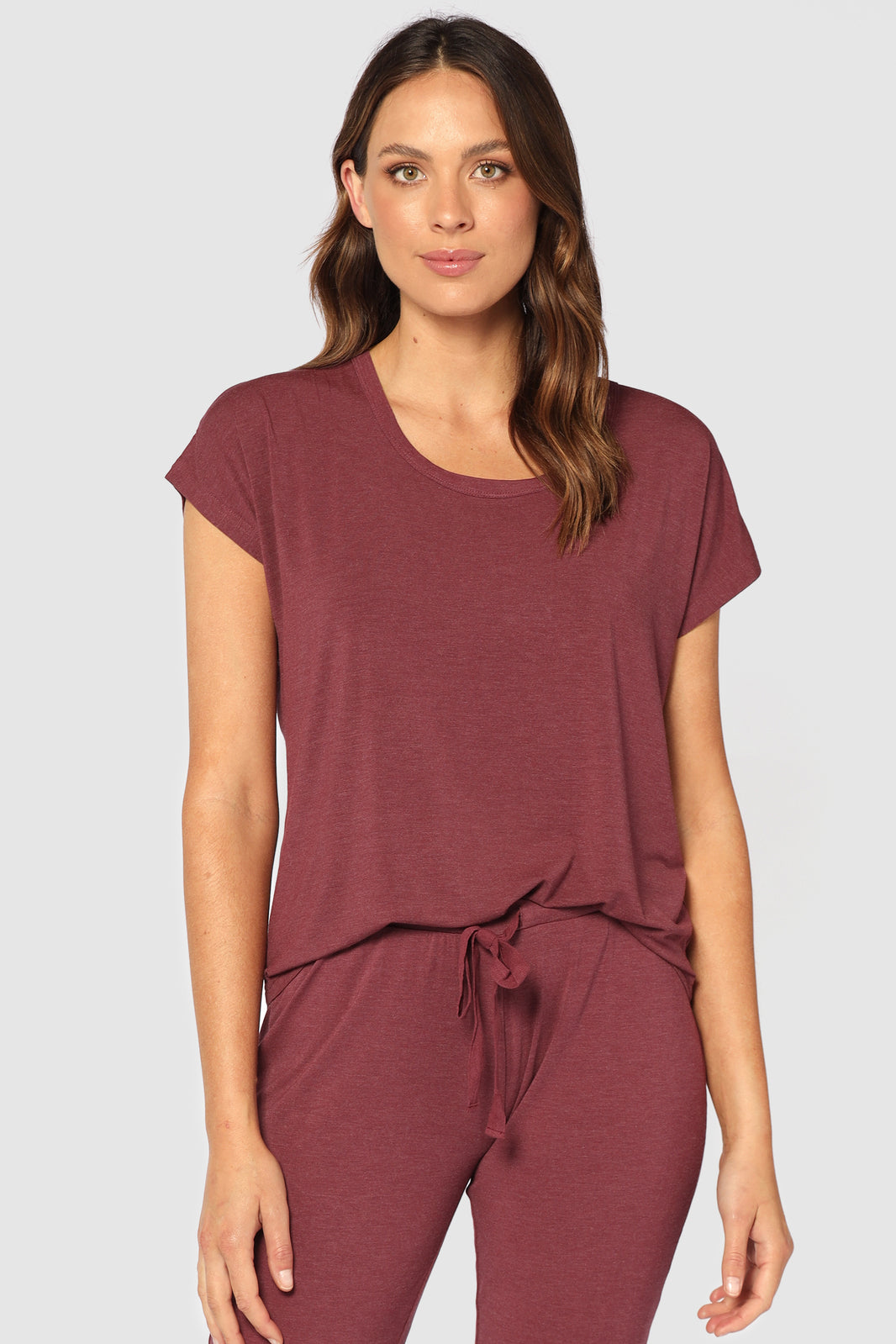Burgundy lounge tee featuring short sleeves and a relaxed, oversized fit.