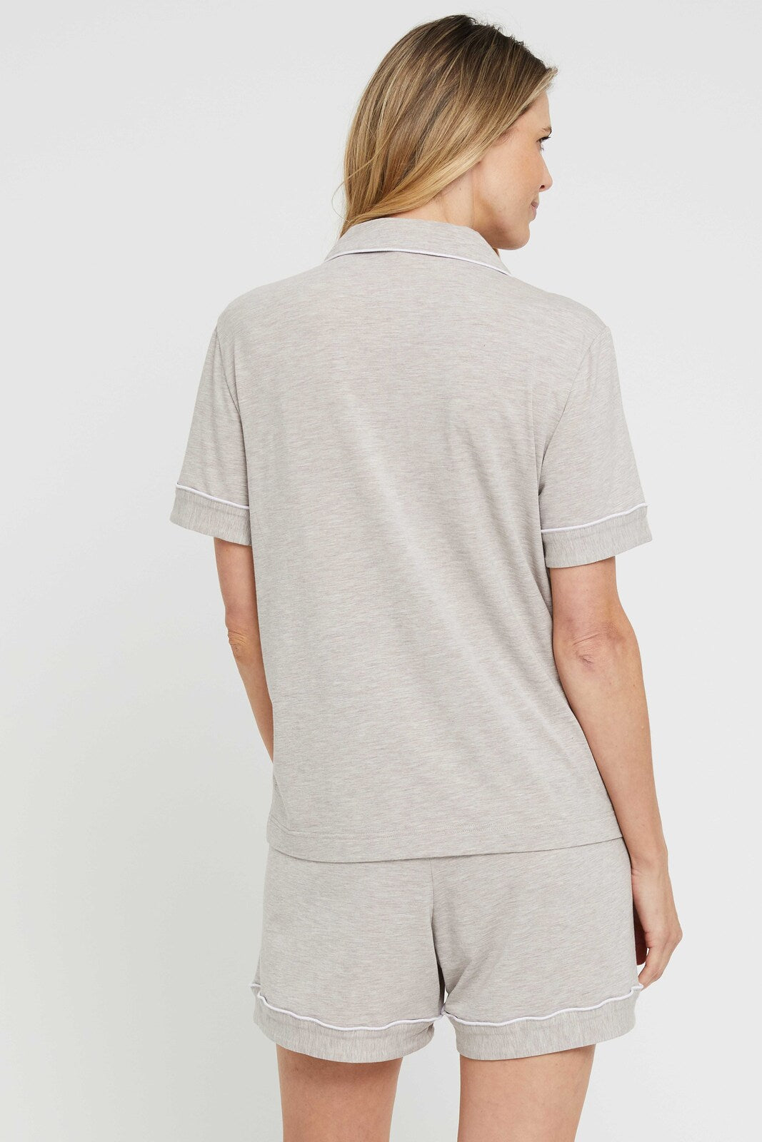 Back view of comfortable ladies pyjama set in beige, made from breathable bamboo fabric.