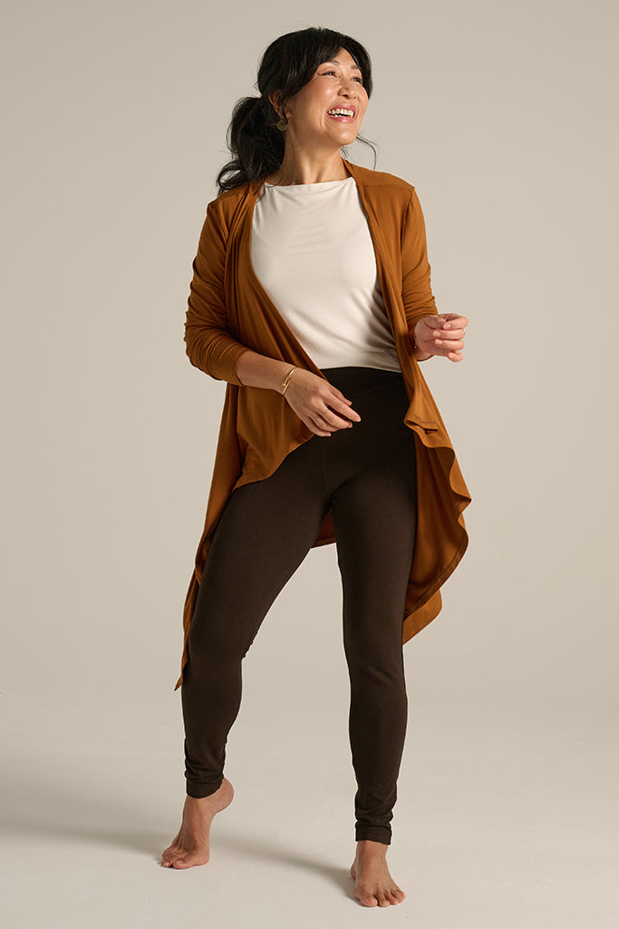 Woman wearing a brown leggings with comfy soft waist
